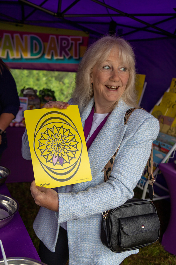 The Mayoress showing off her Sand Art!